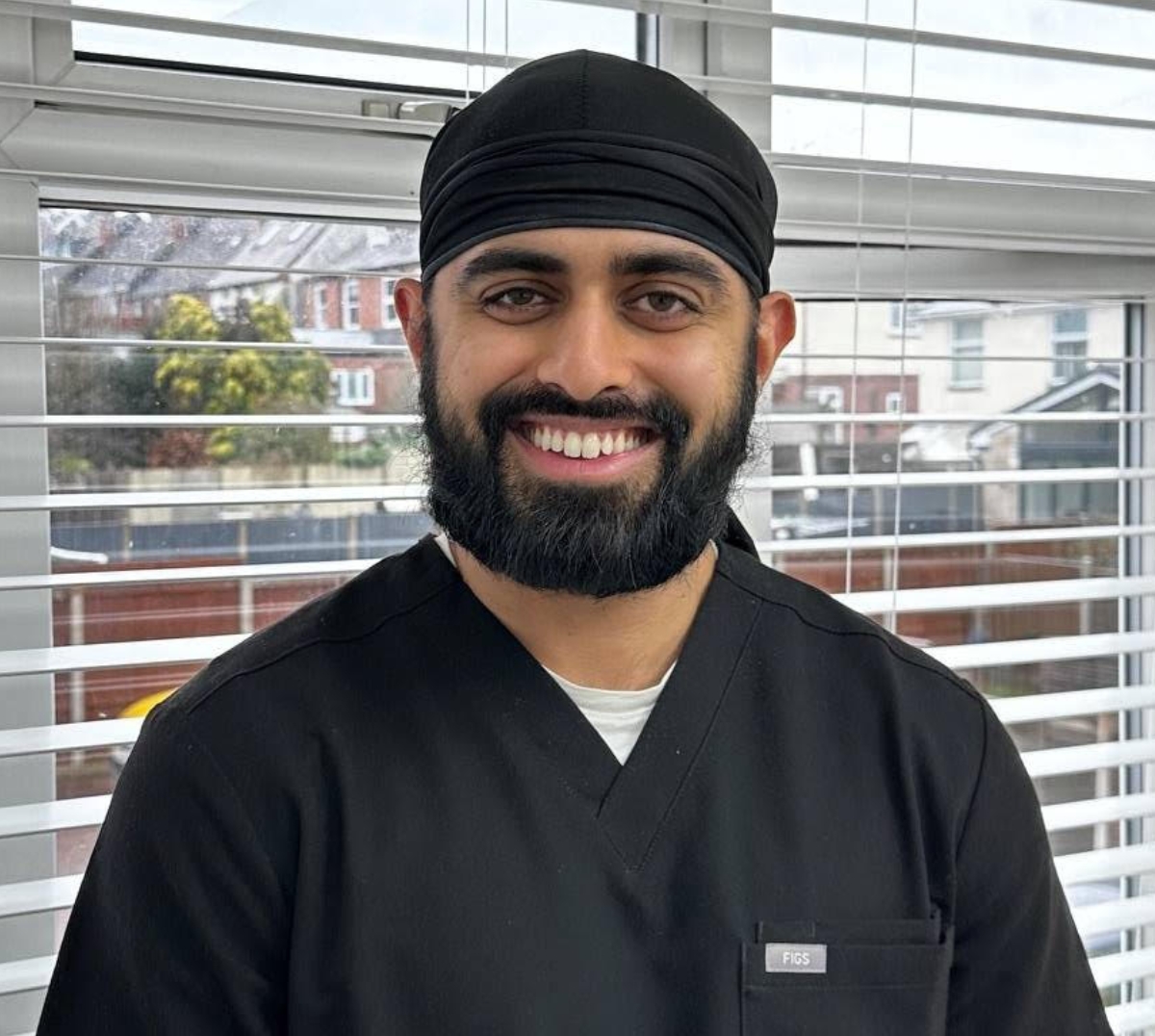 Dr Arjun Singh